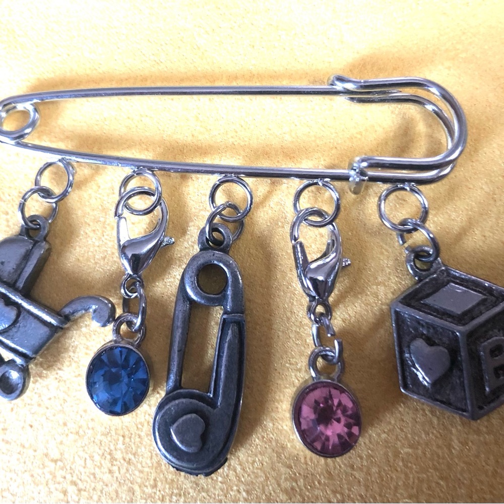 NWT, Handmade by A Charmed Life. Silver Baby Pin